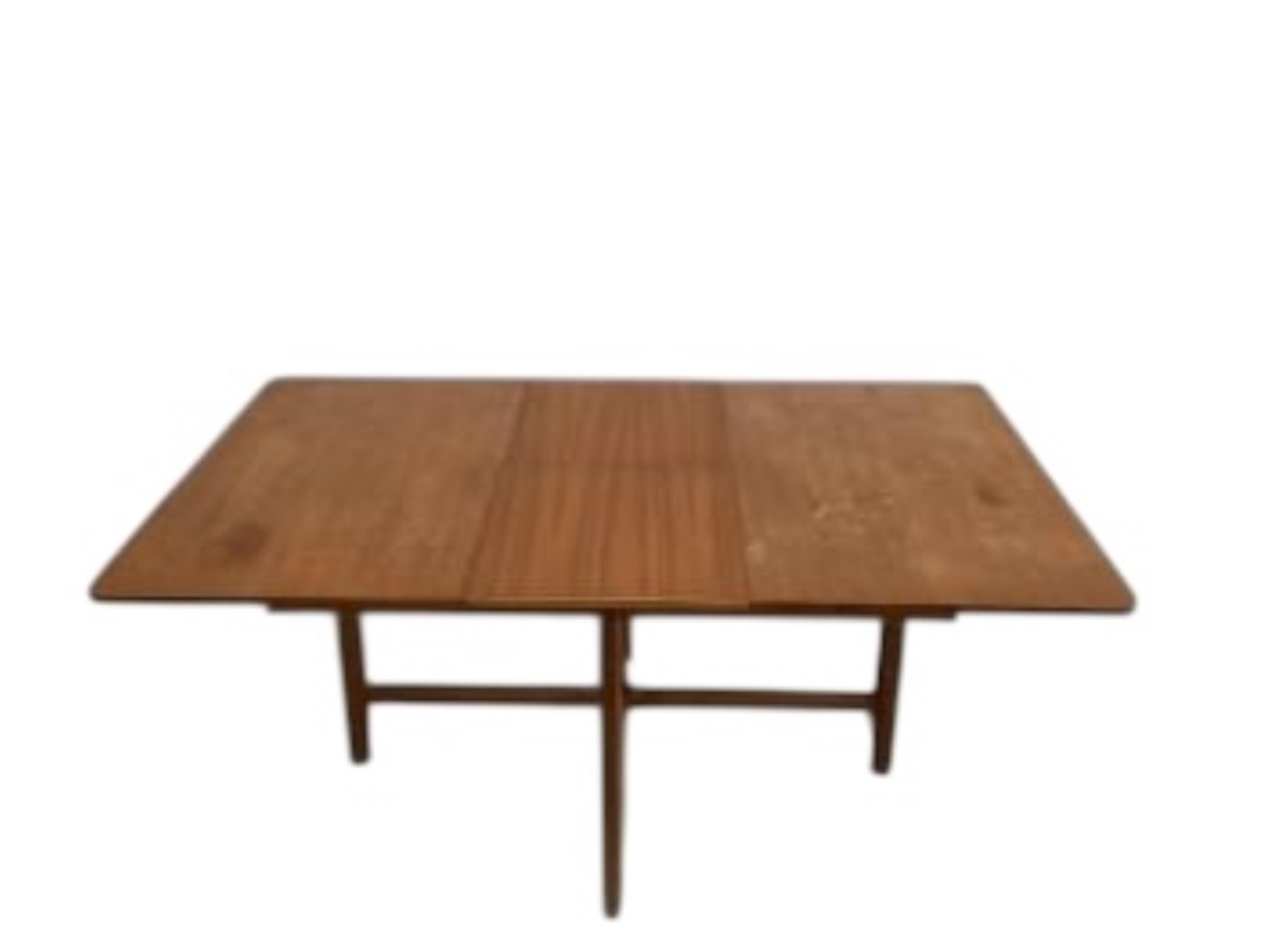 A mid century Danish style MacIntosh Forfar teak sideboard, width 170cm, depth 46cm, height 102cm together with a McIntosh teak extending dining table and four chairs